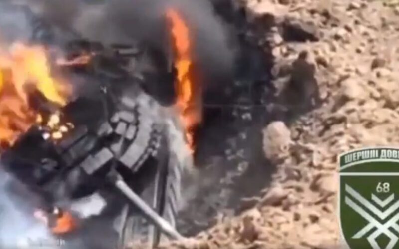 A Russian tank stuck in a large crater became a sitting duck for Ukraine's drones, a video appears to show