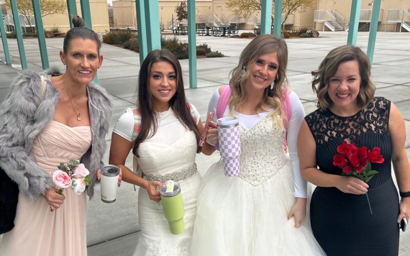 A school told its staff to wear something from the back of their closet, so 2 teachers dug out their wedding dresses