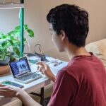 My son's video game habit worried me but it fueled his interest in coding, robots, and AI. At age 16, he won $55,000 at a science fair.