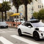 Alphabet is pouring billions into Waymo's self-driving taxis as Tesla prepares to reveal its rival