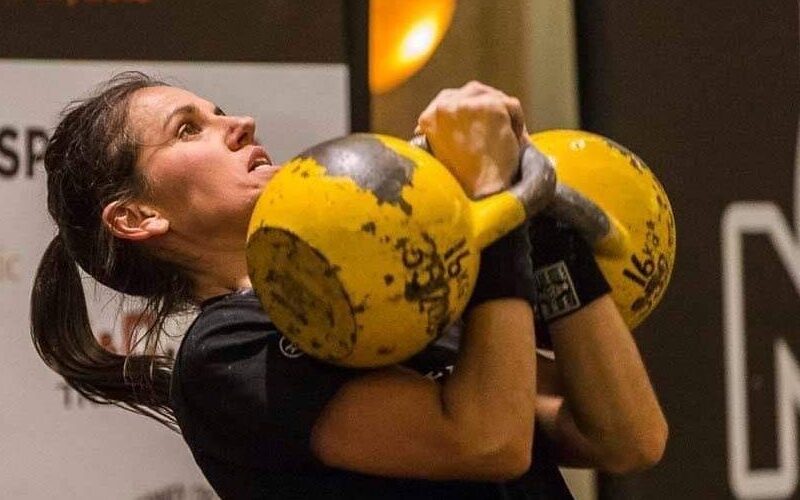 Kettlebells can help you gain muscle and cardio fitness at the same time. Here's what to know, according to a world-record athlete.