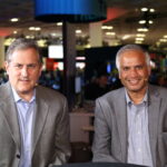 Impetus Technologies' CMO Jeff Veis and CRO Anand Raman talk with theCUBE about legacy data migration at Data + AI Summit.