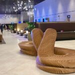 I spent 9 hours in Qatar Airways' newest airport lounge. It had perks, but the quiet rooms felt like a dentist's office.