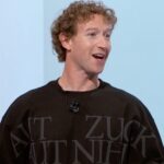 Mark Zuckerberg's shirt says 'All Zuck or All Nothing' in Latin