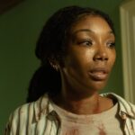 The shocking twist ending of Brandy's new A24 horror movie might not be what you think, says 'The Front Room' directors