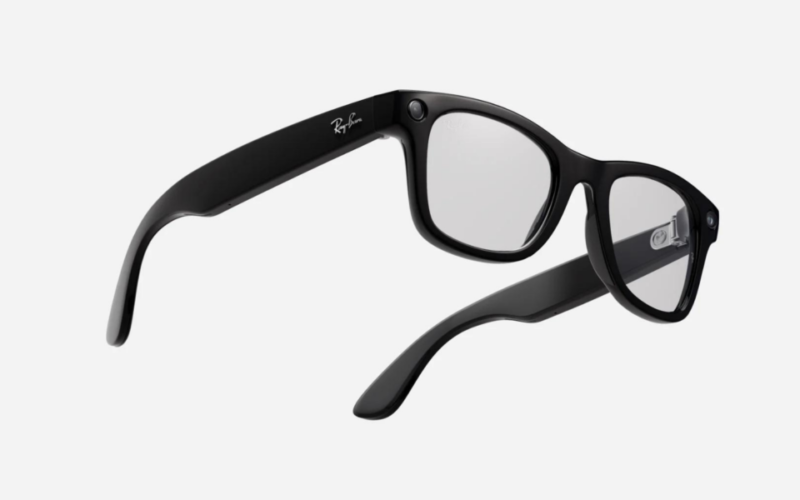 Black frames smart glasses with clear lenses.