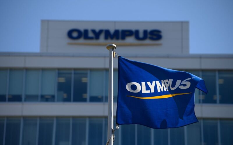 Olympus’s CEO Exits After Probe Into Drug Buying Allegation