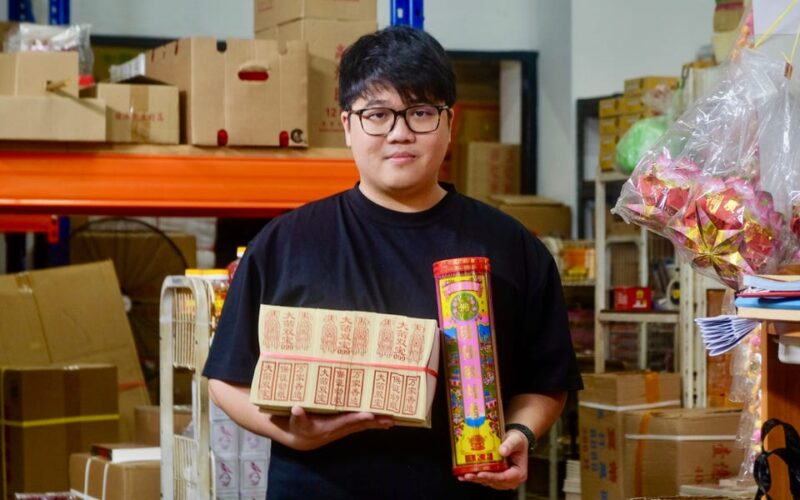 He quit his corporate job at age 28. Now, he runs his family's business of selling paper gifts for the dead.