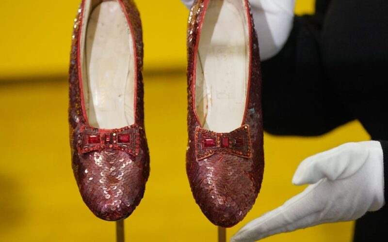 Ruby slippers worn by Judy Garland in 'The Wizard of Oz' sell for a record $28 million at auction